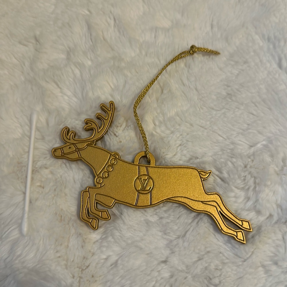 LOUIS VUITTON Gold Reindeer ornament LV on center Brand new never used 2023